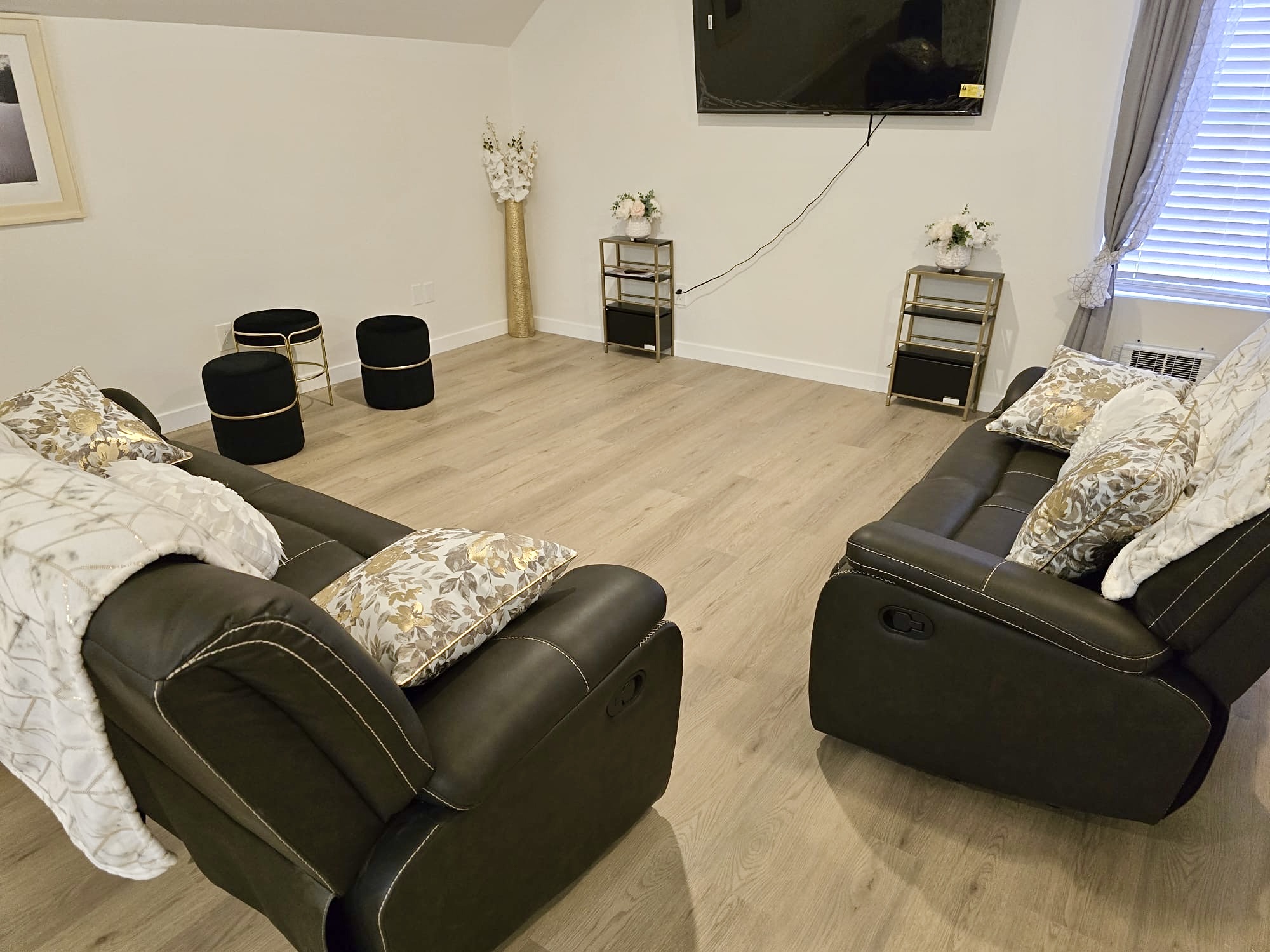 Living room with comfortable seating and TV